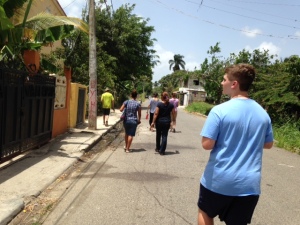 Our group walks down the street in Santiago to invite people to attend VBS.